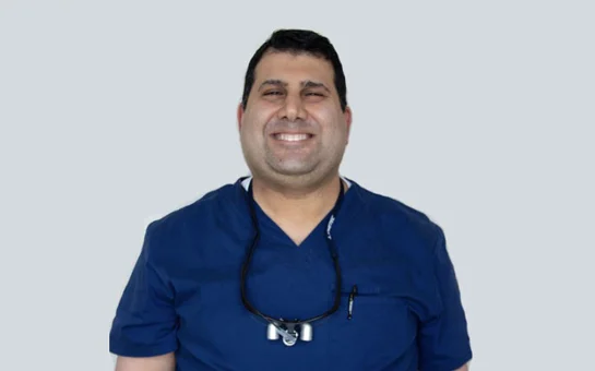Dr. Rush Hejazi wearing scrubs